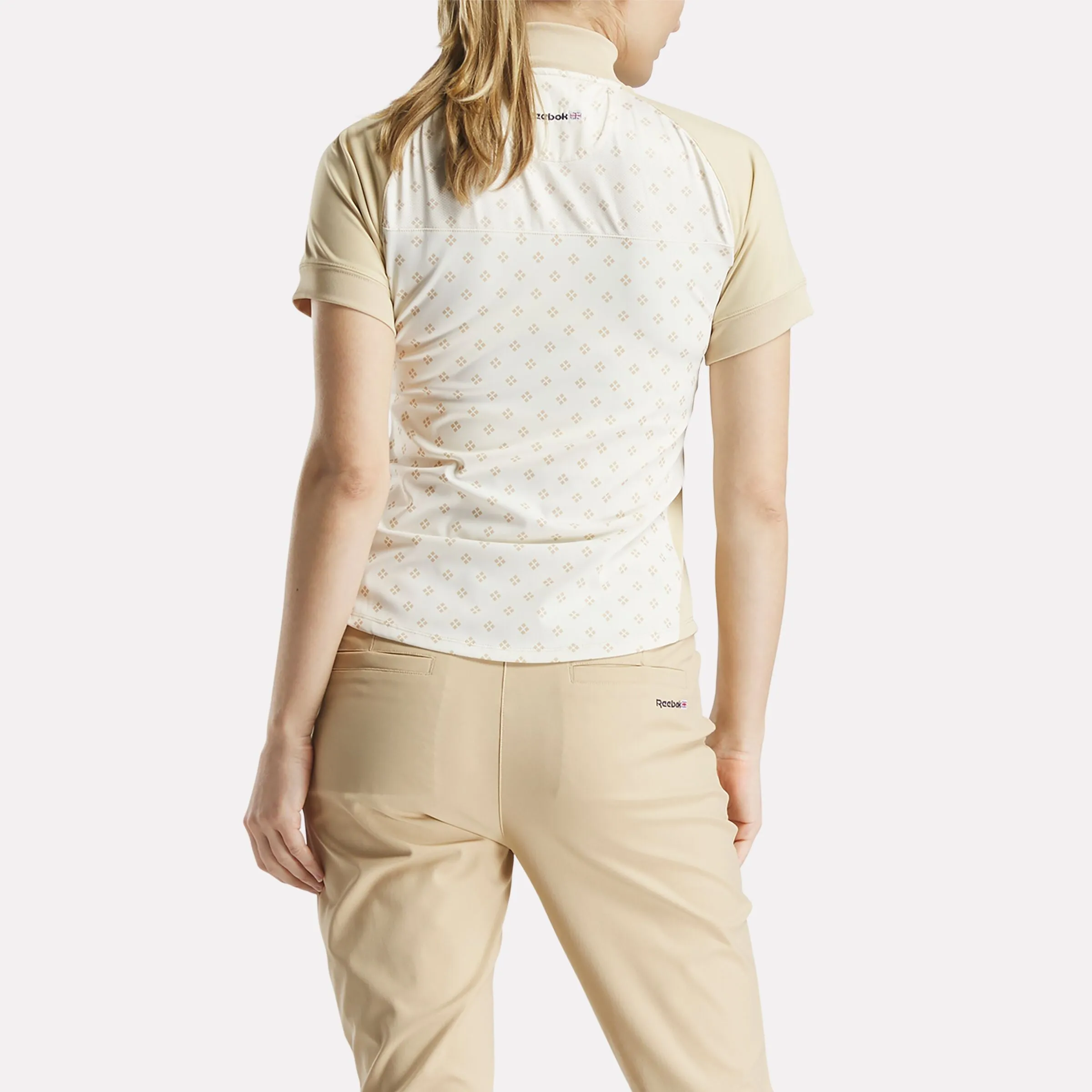 Women's Short Sleeve 1/4 Zip Mini Argyle Print Top